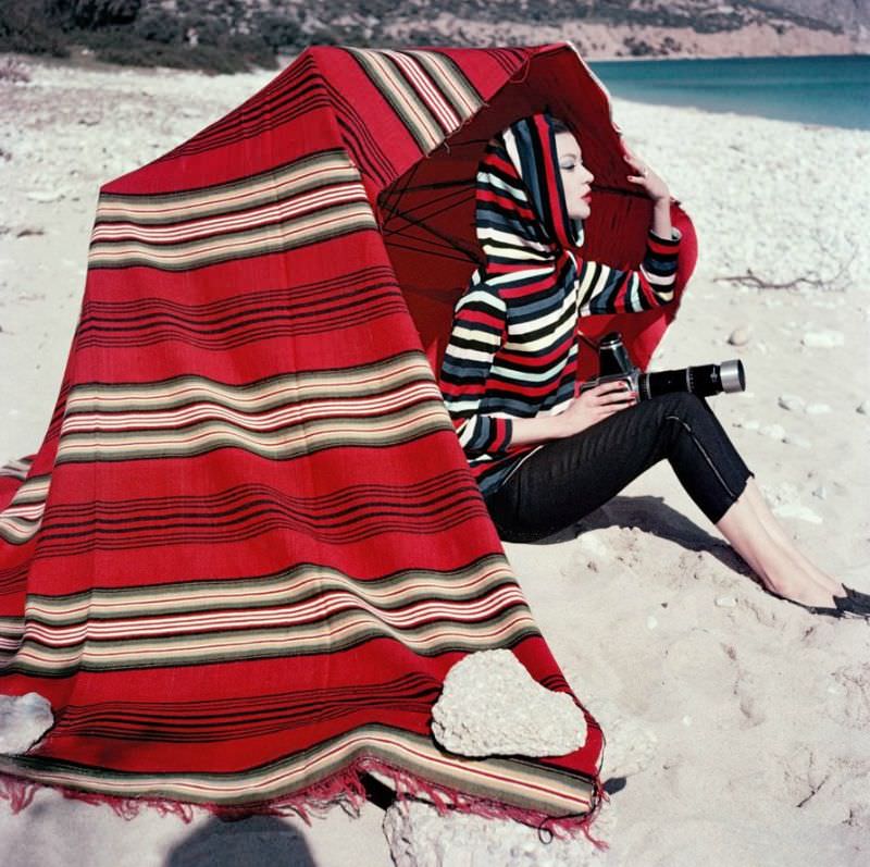 Barbara Mullen in striped hooded top and pants by Christian Dior Boutique, photo by Lionel Kazan, Greece, Elle, 1956