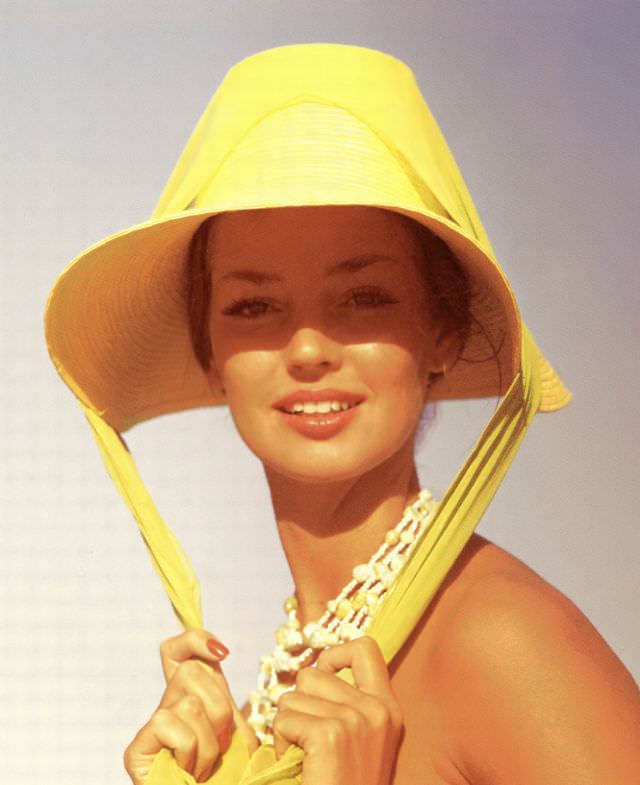 Dolores Hawkins in white two-piece, photo by Lionel Kazan, Glamour, July 1960