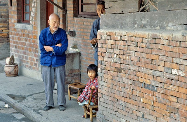 Jiangsu. Chinese family operating a small freight barge on the Emperors Channel, Wuxi