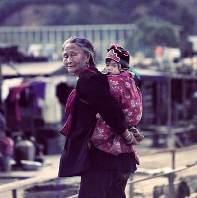 Old lady and baby in Tai Po, 1972