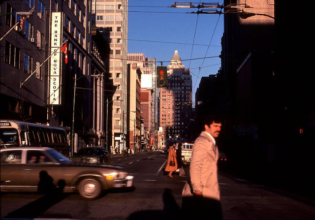 Morning view looking west on Hastings toward the Marine Building, Vancouver, February 1978