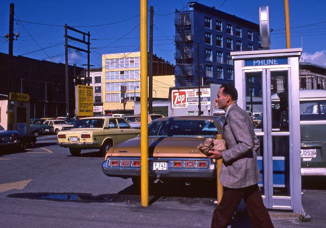 The yellow building is the Army and Navy store at 31 W Hastings and the blue building was the former Burns Block at 18 West Hastings, Vancouver, April 1978
