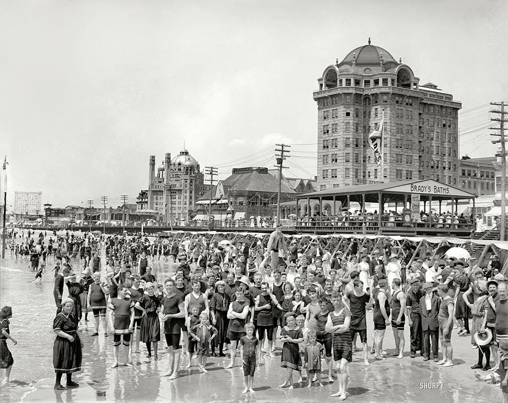 Circa 1906, Atlantic City bathers peering a century into the future. Hotel Traymore and Brady's Baths." At left, the domed Marlborough-Blenheim hotel.