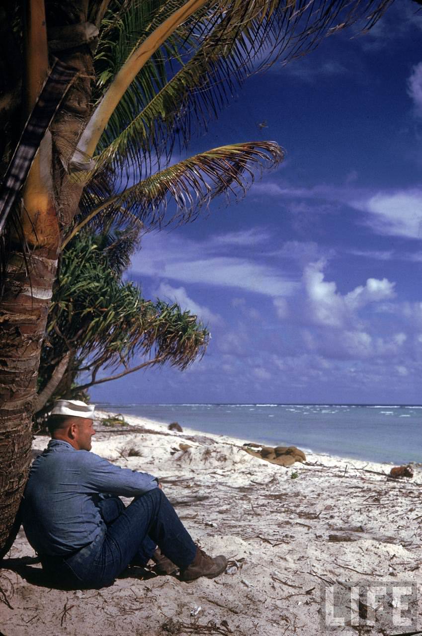 US sailor gazing at the sea from the Tarawa atoll during WWII.
