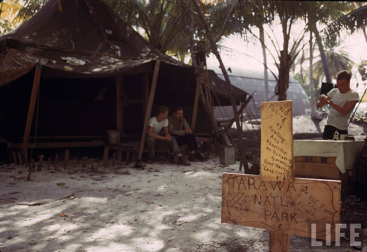 Comical sign reading TARAWA NATIONAL PARK on Tarawa during WWII.