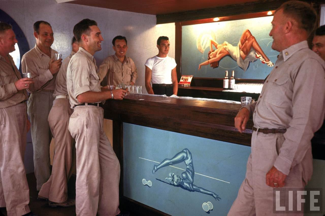 US servicemen enjoying a drink in an Officer's Club on Tarawa during WWII.