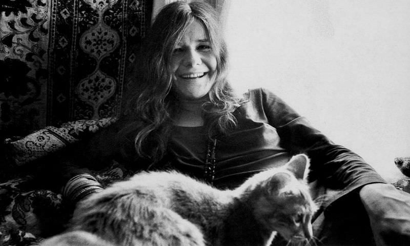 Janis Joplin with her cat at home in Haight-Ashbury, San Francisco, 1967