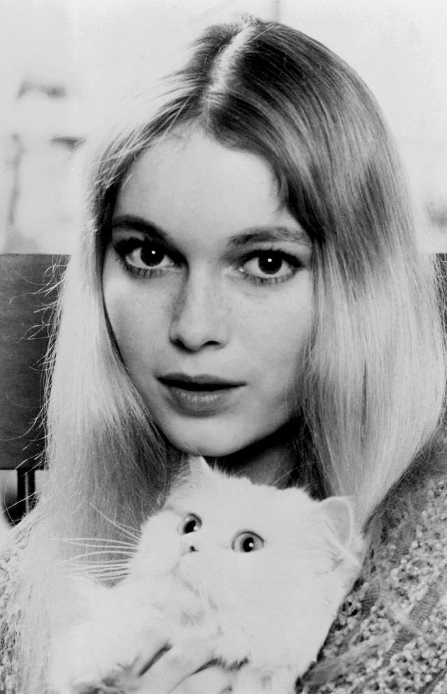 Mia Farrow with her cat 'Malcolm,' 1965
