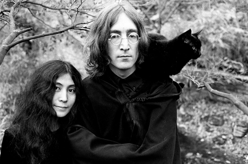 Yoko Ono and John Lennon with a cat, Weybridge, Surrey, England, 1968