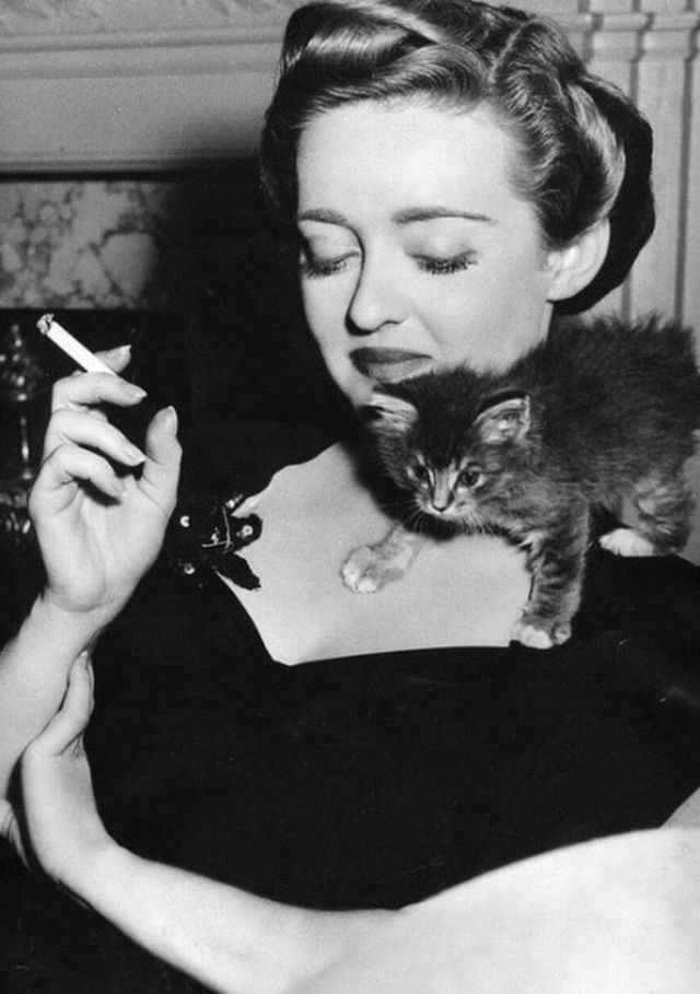 Bette Davis with Lonesome the kitten, April 1943