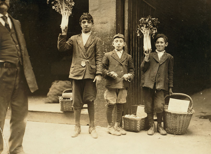 Fruit peddlers. Boston 1915 exhibit. Location: Boston, Massachusetts