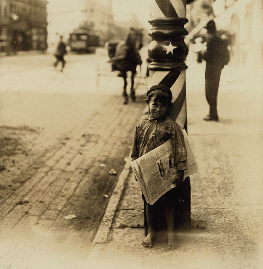 A little “shaver,” Indianapolis newsboy, 41 inches high. Said he was 6 years old. Aug., 1908. Location: Indianapolis, Indiana
