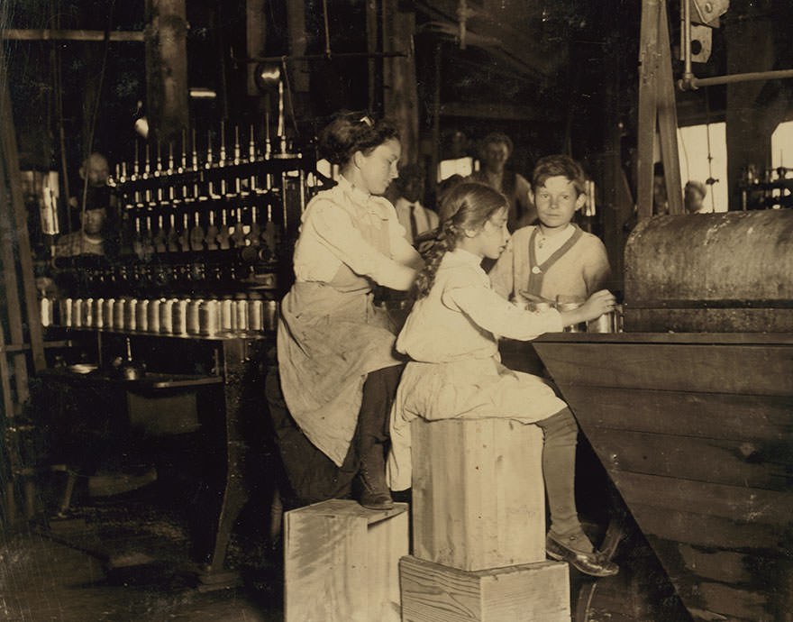 Daisy Langford, 8 yrs. Old works in ross’ canneries. She helps at the capping machine, but is not able to “keep up.” She places caps on the cans at the rate of about 40 per minute working full time. Location: Seaford, Delaware