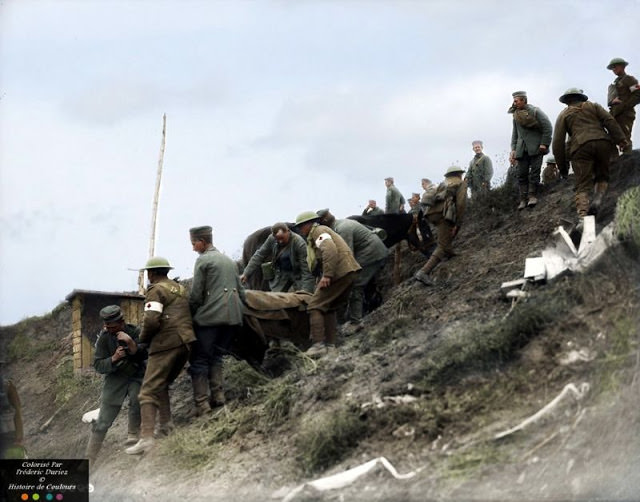 Bringing wounded down an awkward slope, Advance East of Arras, October 1918