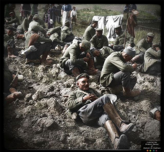 German prisoners at work ( beef drivers pause then plowing in a field)