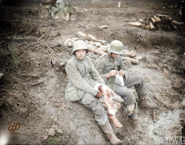 The Battle of the Menin Road Ridge. Two wounded Germans, one showing the newly dressed wound in his leg, at a dressing station at Zillebeke, 20 September 1917