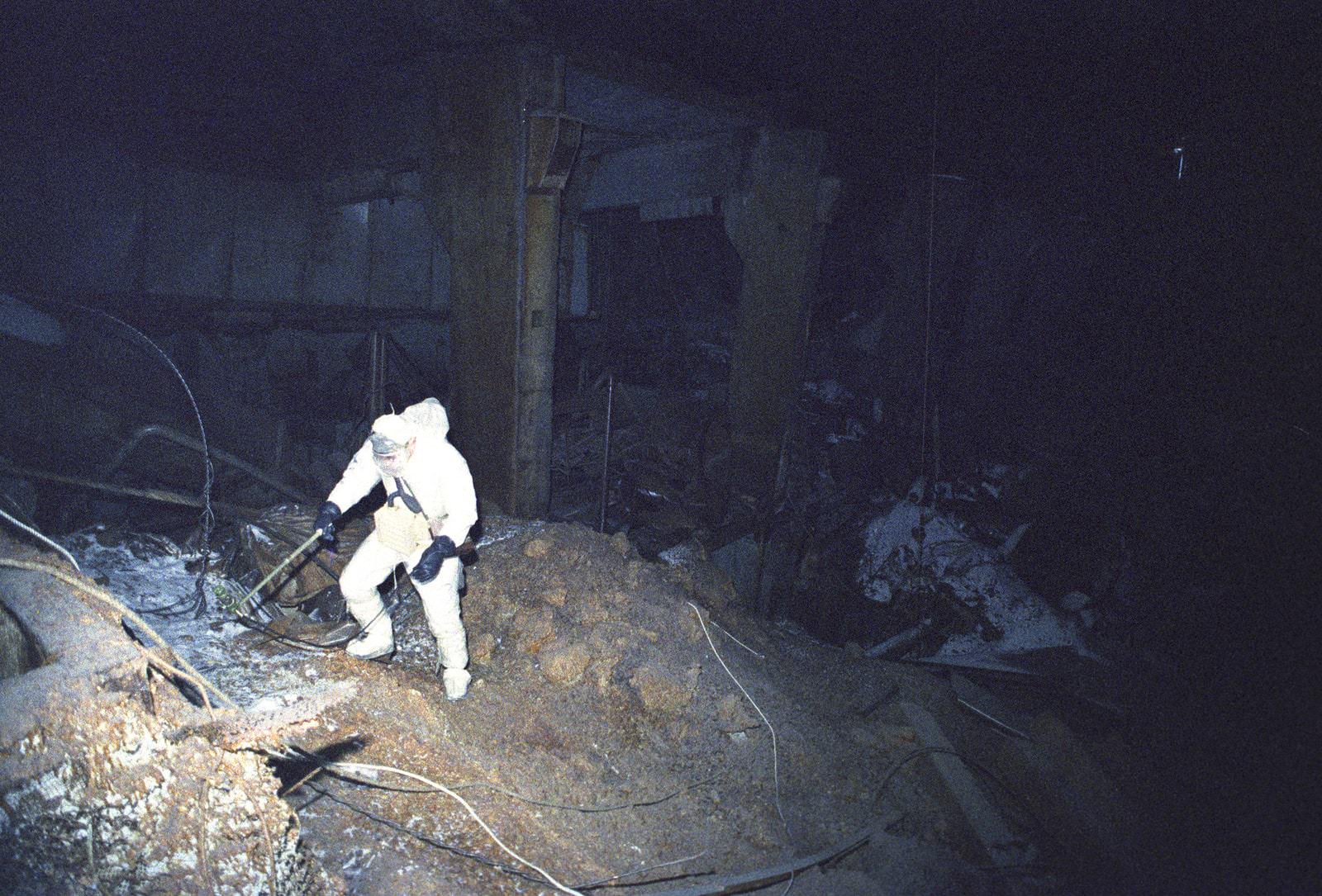 A lone scientist descending into the radioactive darkness of Chernobyl in 1986