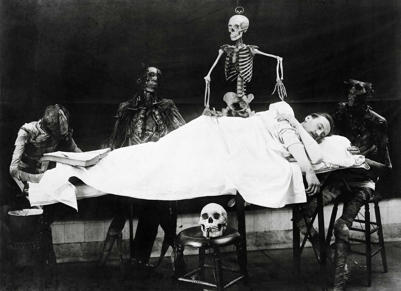 This macabre scene of a mortician haunted by his day job in 1910