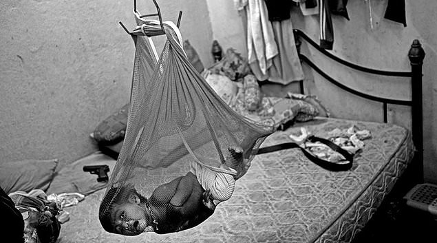 A baby in a refugee home in Kuala Lumpur, Malaysia