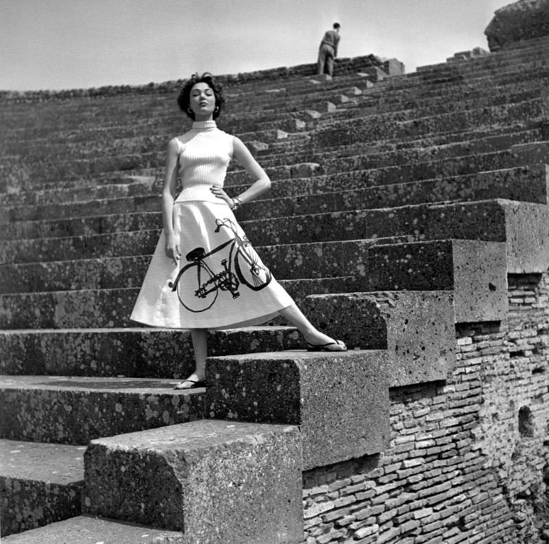 Ivy Nicholson is wearing tricot top with skirt painted by Scarpitta Mirycae, Ostia, Italy, ELLE, June 16, 1952