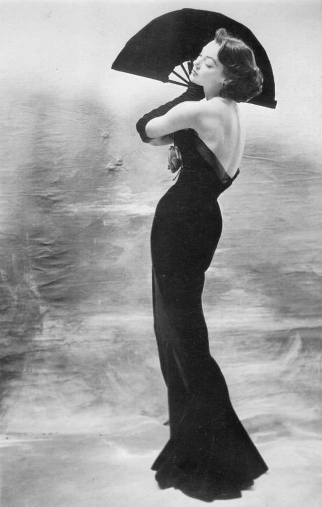 Ivy Nicholson in slim gown by Maggy Rouff, 1953