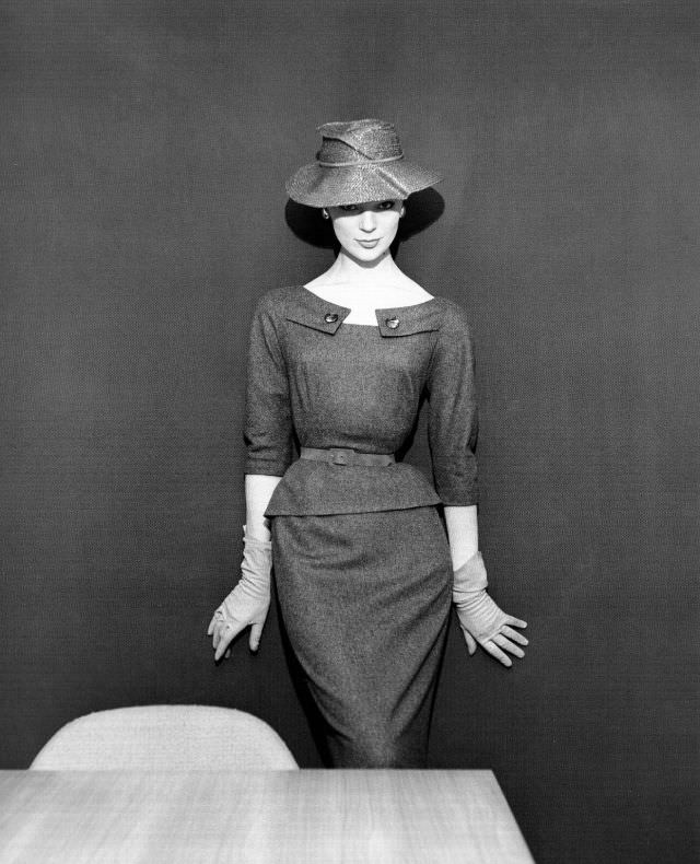 Ivy Nicholson in grey flannel two-piece dress and straw hat by Pierre Clarence, Nouveau Femina, March 1954