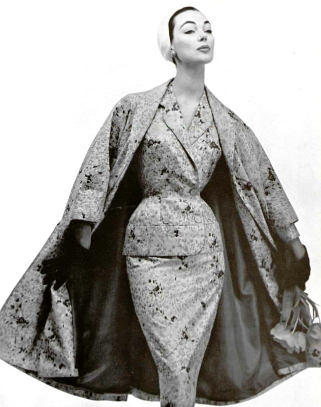 Ivy Nicholson in satin print suit and matching coat by Nina Ricci, 1955