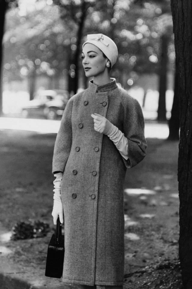Ivy Nicholson wearing Balenciaga double-breasted mandarin collar coat, 1955