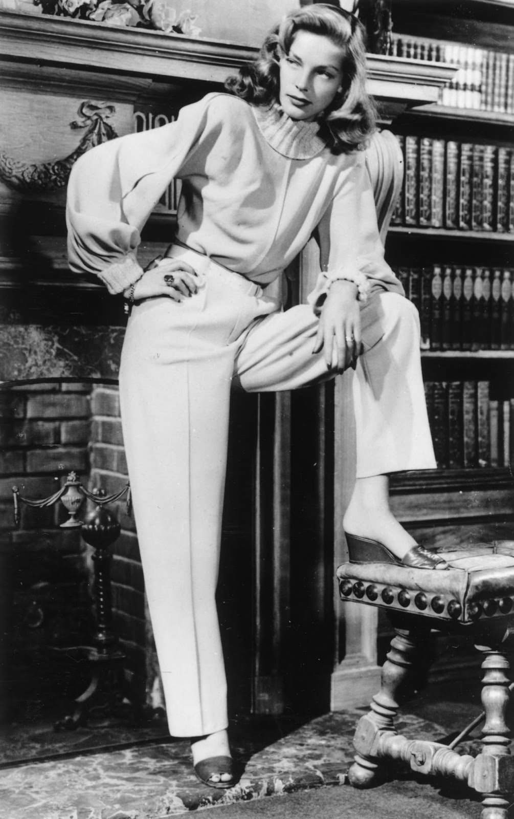 In 1946, the actress got bookish in a wool suit, the work of designer Leah Rhodes.