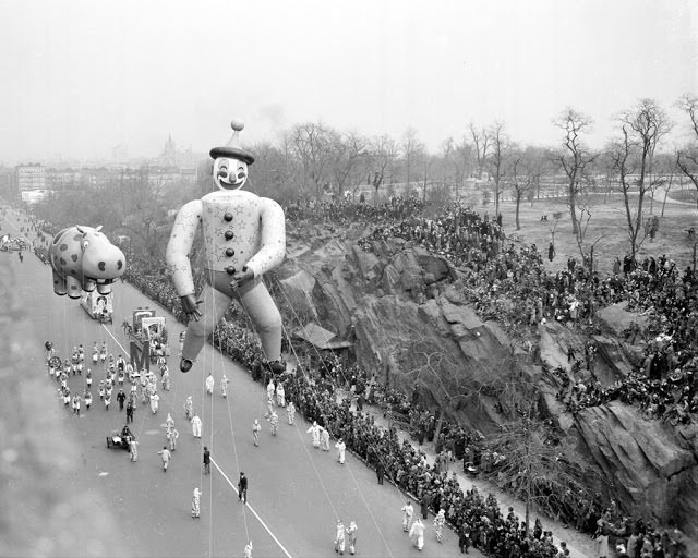 Dopey Clown and a hippo in Macy's annual Thanksgiving Day parade trundles down Central Park West in 1940.