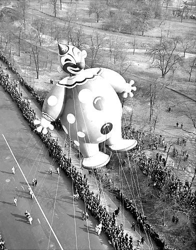 A huge balloon in the form of comic fireman floats over Broadway during the annual Macy's Thanksgiving Day Parade in New York, Nov. 25, 1948.