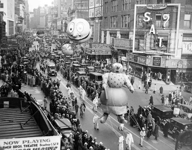 The Macy's Thanksgiving Day Parade passes down Broadway in New York on Nov. 27, 1930