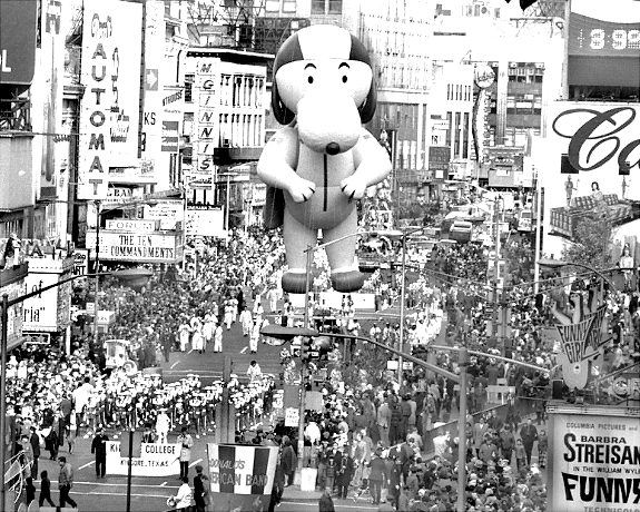 The Kilgore, Texas band struts its stuff and so does Snoopy at the 43d annual Macy's Thanksgiving Day Parade in 1969.