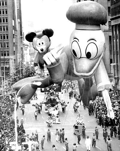 The Kilgore, Texas band struts its stuff and so does Snoopy at the 43d annual Macy's Thanksgiving Day Parade in 1969.