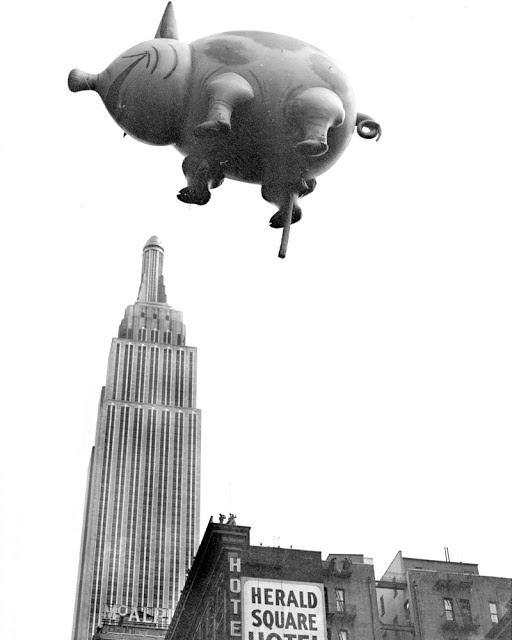 This blind pig is not a speakeasy. He's coming from the 1932 Macy's Thanksgiving Day Parade. And don't let that perspective fool you. Mr. Pig is not really over Empire State Building.
