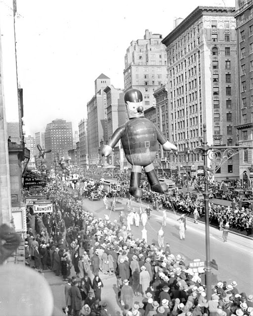 A soldier is marching straight at the Macy's Thanksgiving Day Parade in 1932.
