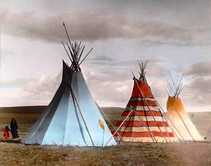 Red Stripe Tipi And The Thunder Tipi. Siksika Camp. Montana. Early 1900s