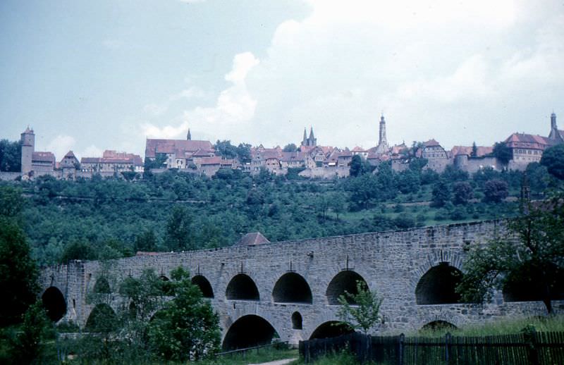 Rothenburg's skyline from the Tauber River valley. The famous "double bridge" is in the foreground. It was built around 1330