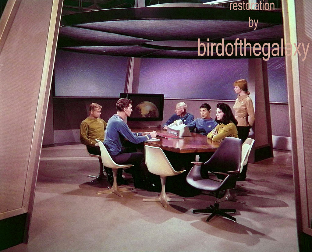 This shot shows a wide view of the set of the briefing room of the Enterprise, during the scene that discusses the fact that Captain Pike has gone missing on the surface of Talos IV.