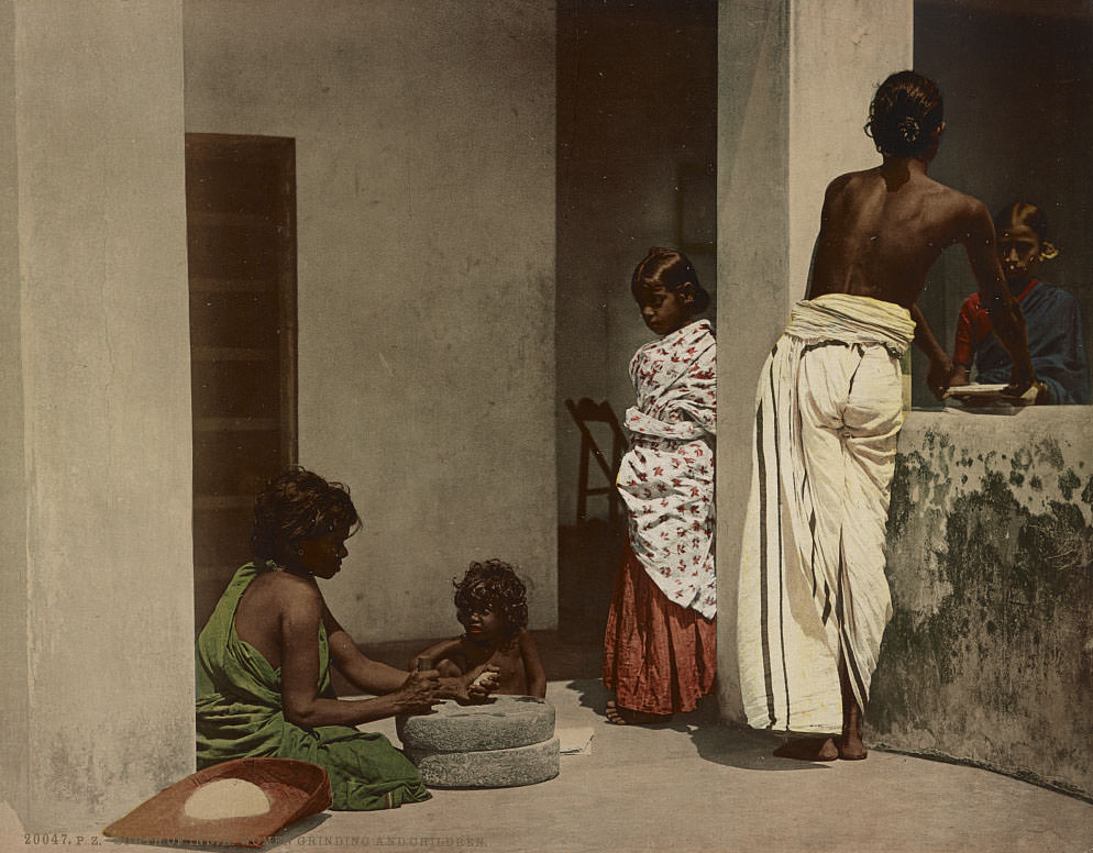 Women Grinding and Children, South of India