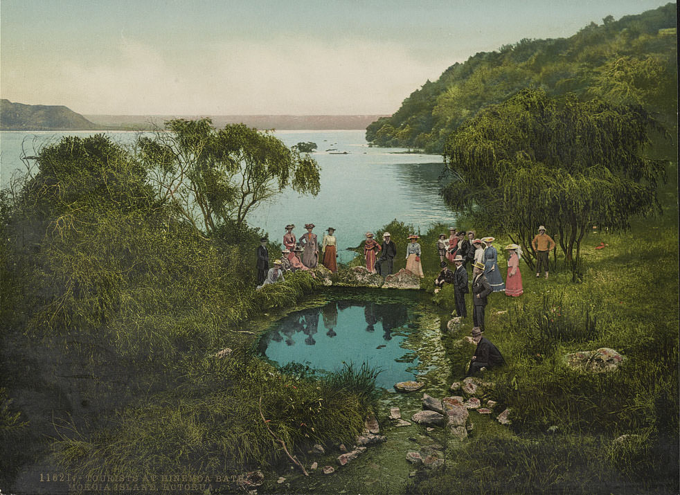Tourists at Hinemoa Bath, Mokoia Island, Rotorua