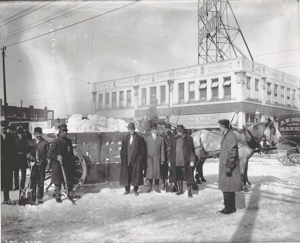 Snow Truck and Cleaning crew on the 2800 block of Chouteau Avenue, 1909