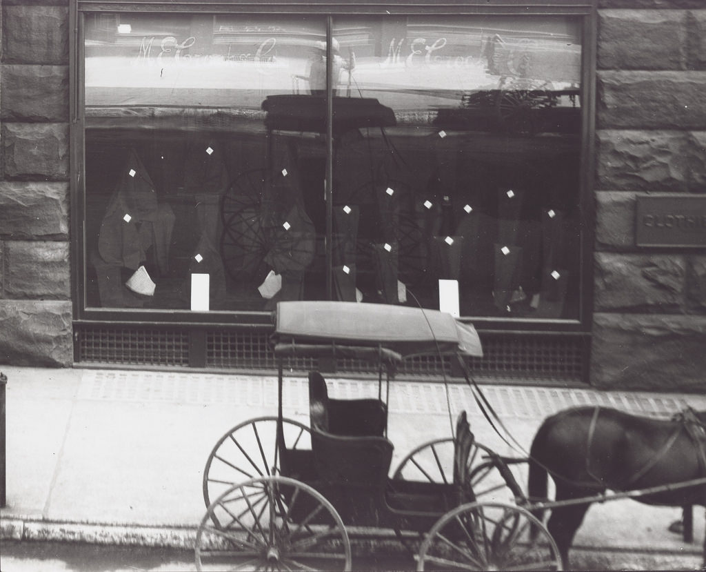 Store front window of M.E. Croak and Company Clothier on the southeast corner of Olive and Tenth Streets, 1904