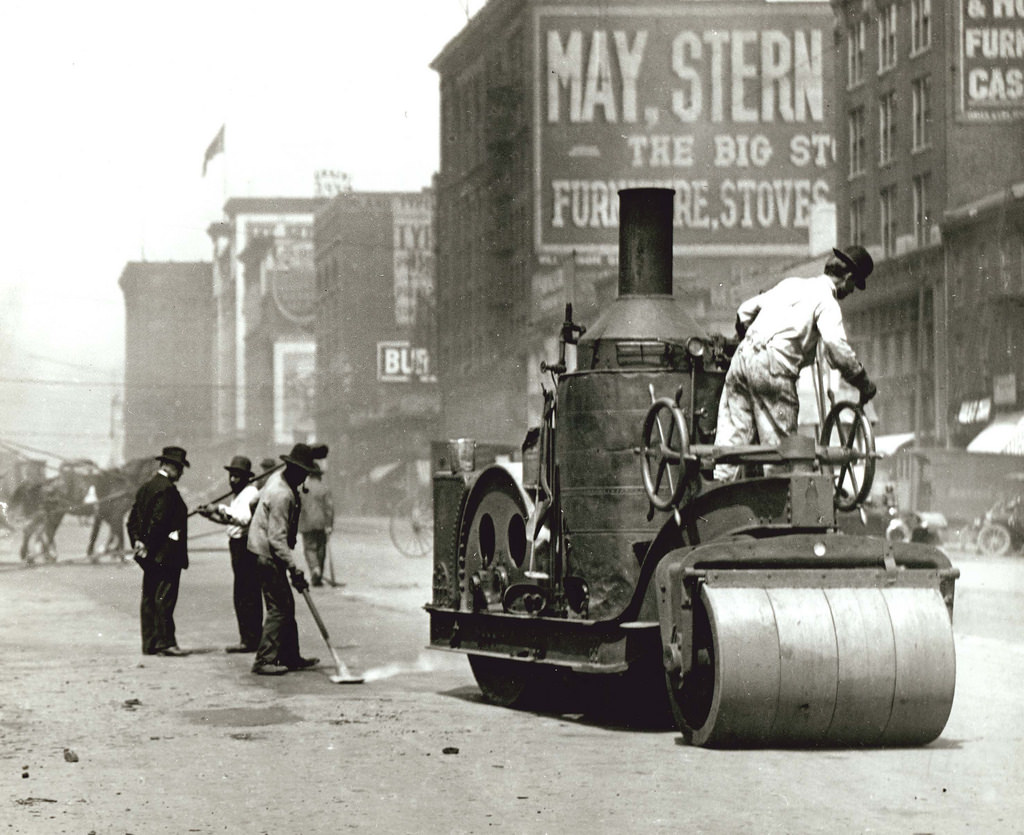 Street workers using a steam roller to repair Twelfth Street between Chestnut and Pine Streets, 1910