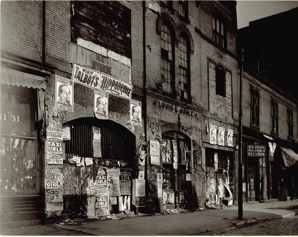 Talbot's Hippodrome posters posted on buildings at 1123 - 1131 Market Street, ca. 1900s