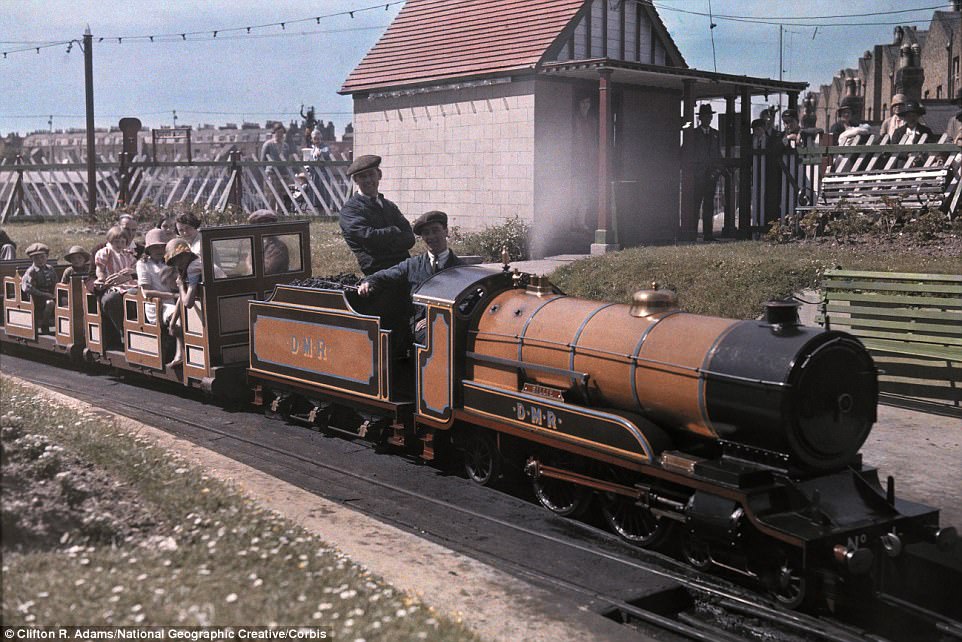 Passengers ride on 'Billy', a locomotive picture running at the Kent seaside resort of Margate in 1931