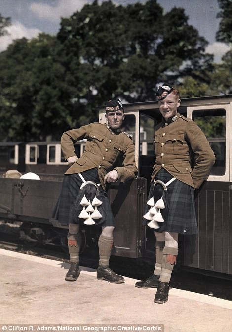 Two soldiers stand in Hythe, Kent, 1928