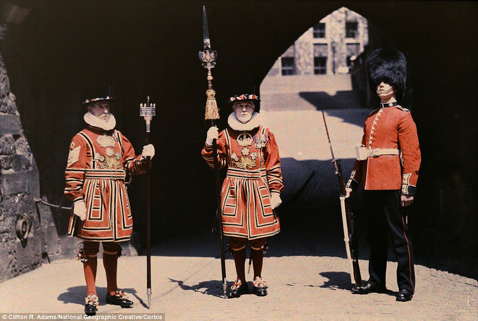 The Chief Warder, a Coldstream Guardsmen, and a Yeoman Warder pose at the Tower of London in 1929