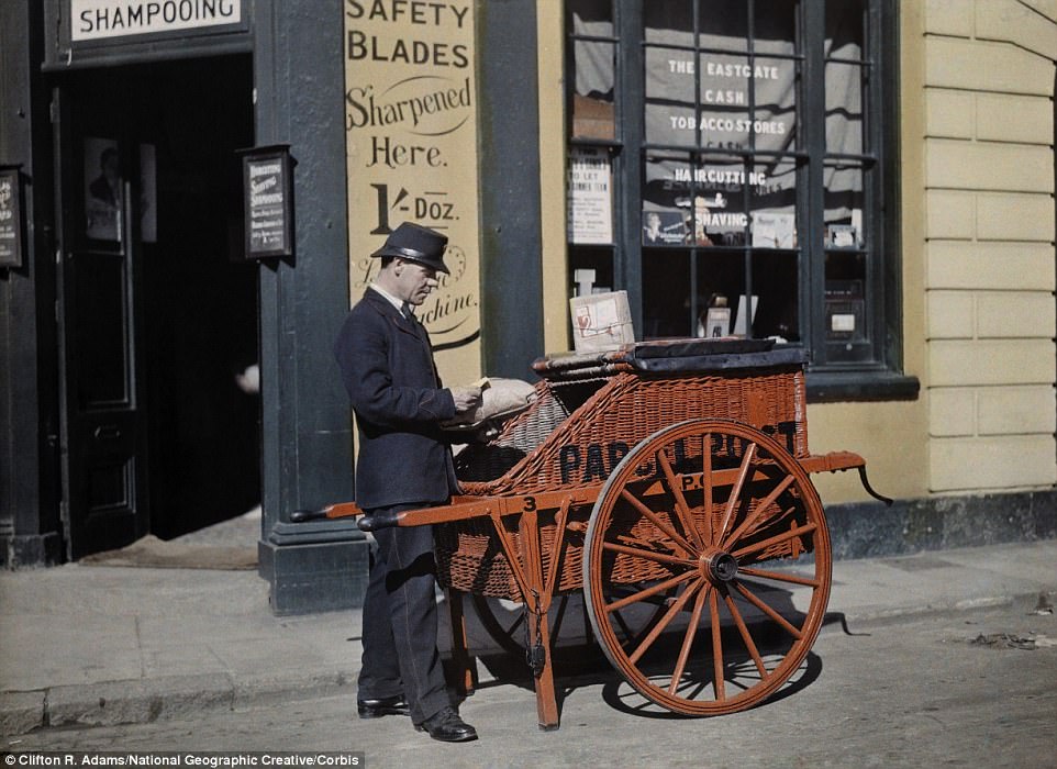 Two women enjoy a leisurely tea in 1928 in front of the Clock House in Buckinghamshire, which was originally a hospice