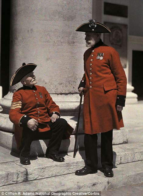 Two Chelsea Pensioners in signature scarlet coats in 1929